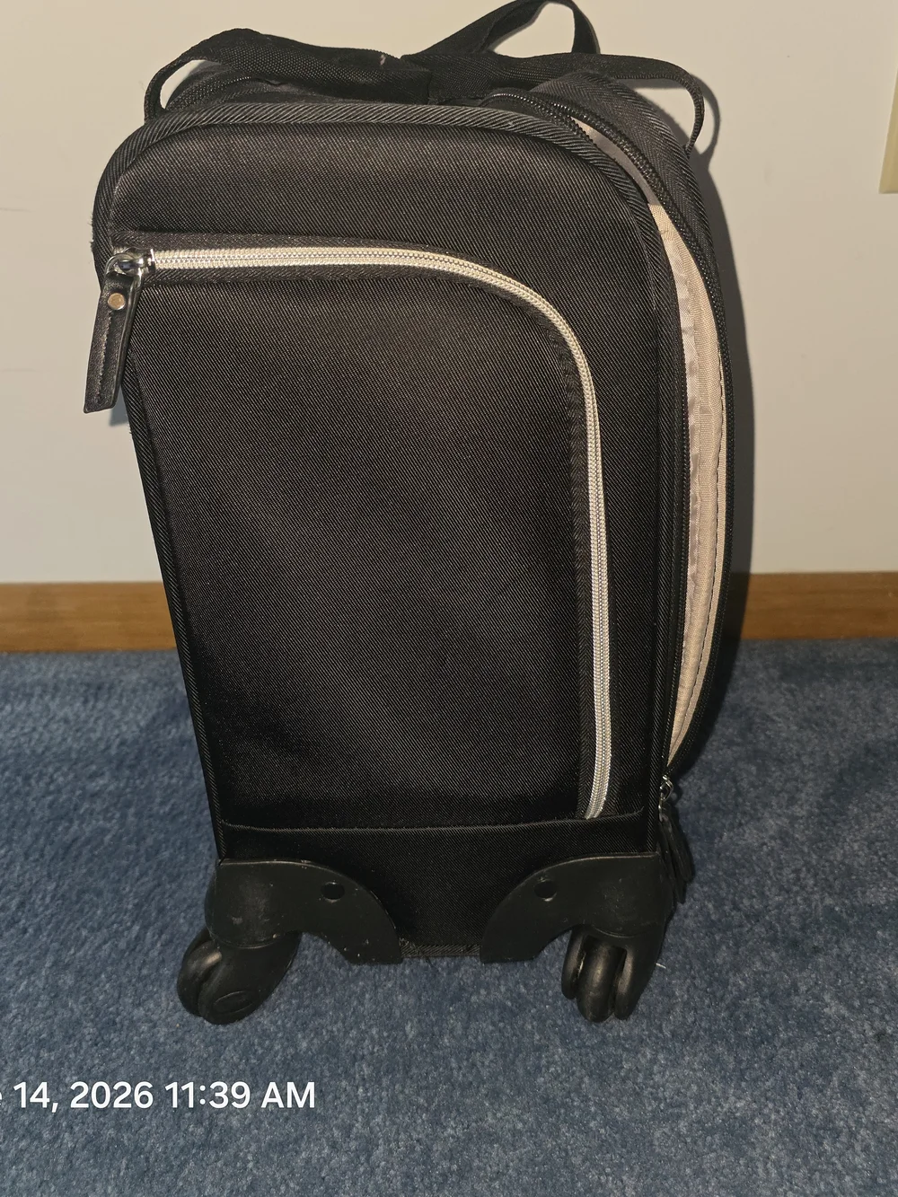 Samsonite Black Compact Rolling Travel Bag with Front and Side Zip Pocket